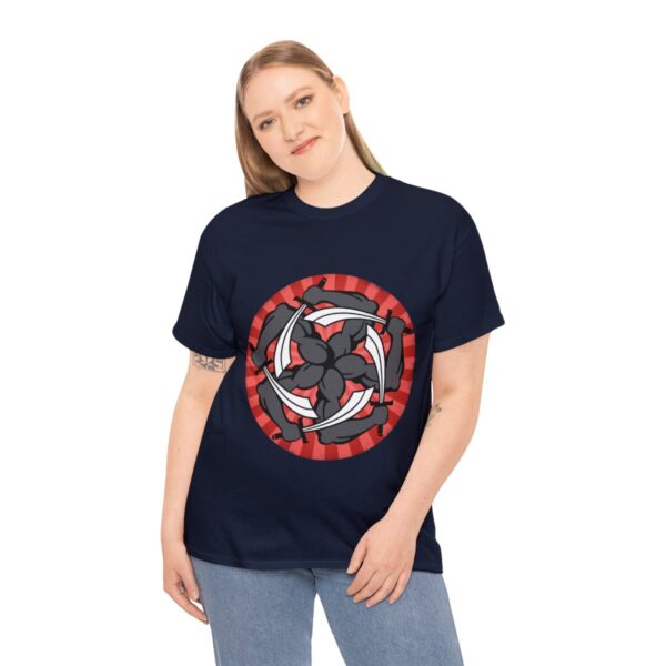A pinwheel of five snaky arms clutching swords, the symbol of Garagos, on a navy blue shirt on a woman