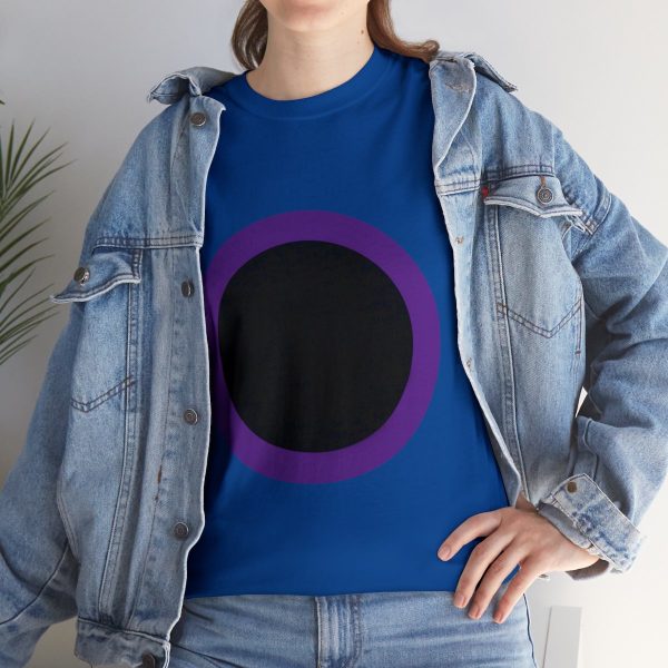 Black disk surrounded by a purple border, the symbol of Shar, on a royal blue t-shirt under a jean jacket