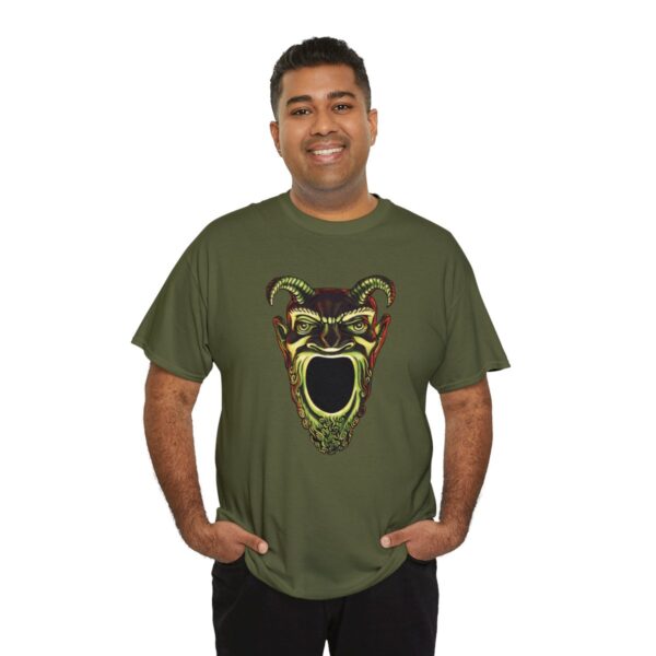 A shirt with the symbol of Acererak, the face of a demon with a gaping maw, a favorite DnD villain, on a military green shirt worn by a man