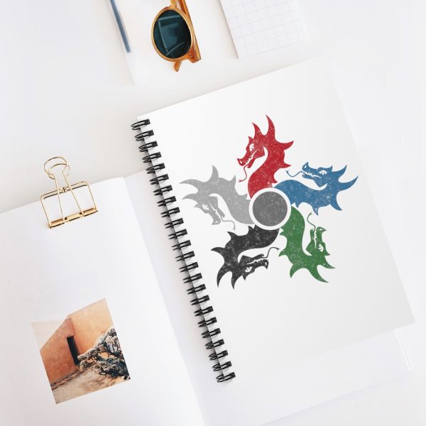 notebook with the symbol of tiamat, a 5-headed dragon, desk