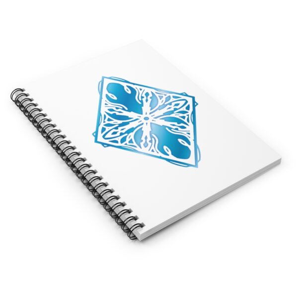 The symbol of Auril, a blue white diamond snowflake, on a notebook, angled
