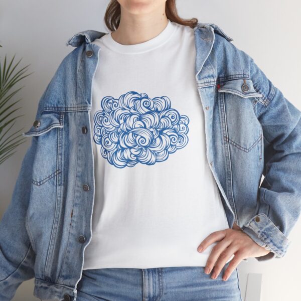 The symbol of akadi, goddess of elemental air - a cloud, on a white shirt under a jean jacket