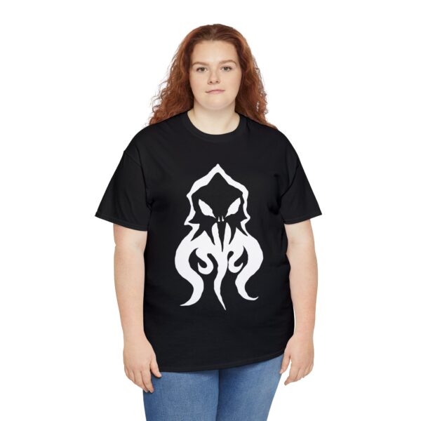 The symbol of Deep Duerra, a broken illithid skull, mindflayer, on a black shirt, worn by a woman