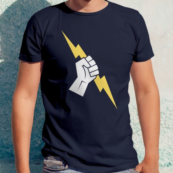 The symbol of Heironeous, a hand holding a lightning bolt, on a navy blue shirt worn by a man against a wall