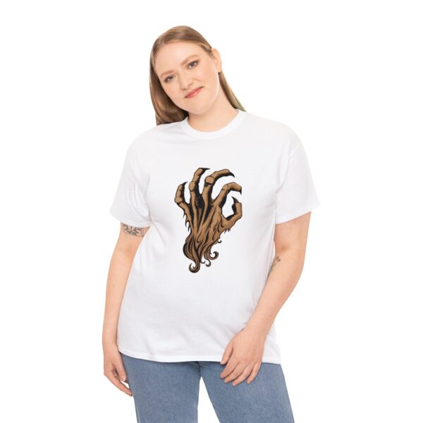 The symbol of Malar, the Beastlord, an upright bestial claw hand with brown fur, on a white shirt worn by a woman