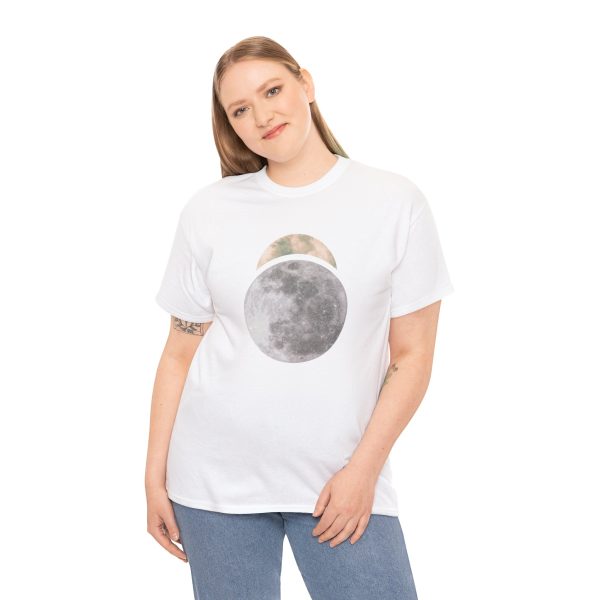 The symbol of Sehanine Moonbow, a misty crescent above a full moon, on a white shirt worn by a woman