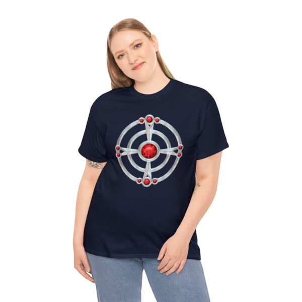 The symbol of St. Cuthbert, a ruby-studded starburst, on a navy blue shirt worn by a woman