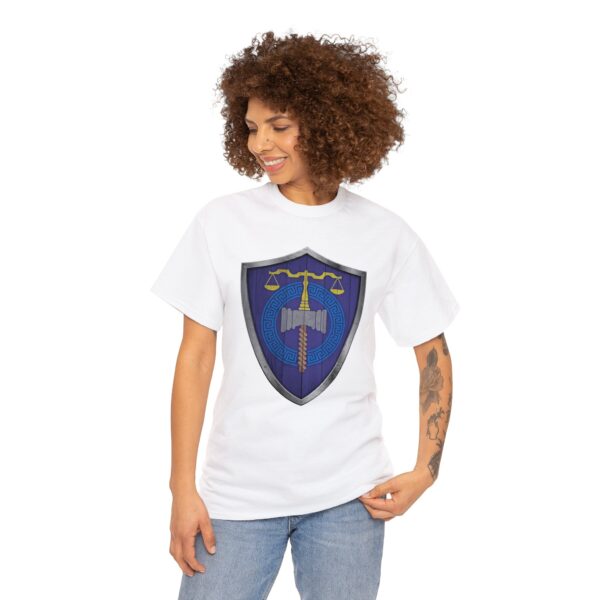 The DnD symbol of Tyr, balanced scales resting on a warhammer, representing justice through force, on a white shirt worn by a woman