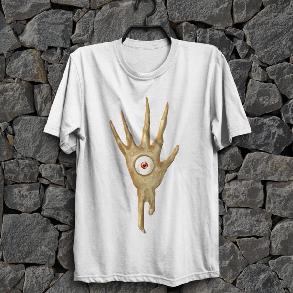 The symbol of Vecna, a hand with an eye in the palm, on a white shirt, hanging on a wall