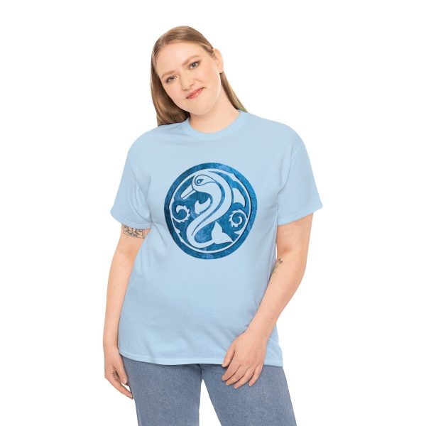 A shirt with the symbol of Deep Sashelas, a jumping dolphin. The god of the aquatic elves. On a light blue shirt worn by a woman