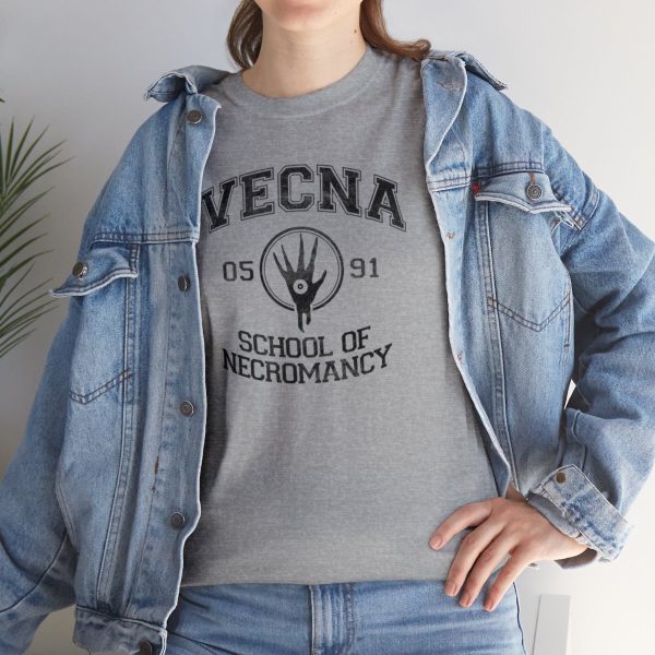 A weathered sport gray shirt with the Vecna School of Necromancy, under a jean jacket
