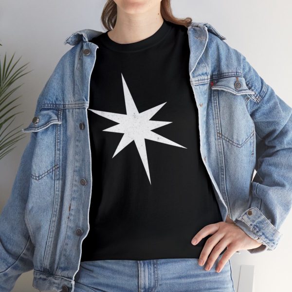 The star ray symbol of Erevan Ilesere, the elven god of mischief and rogue, on a black shirt under a jean jacket