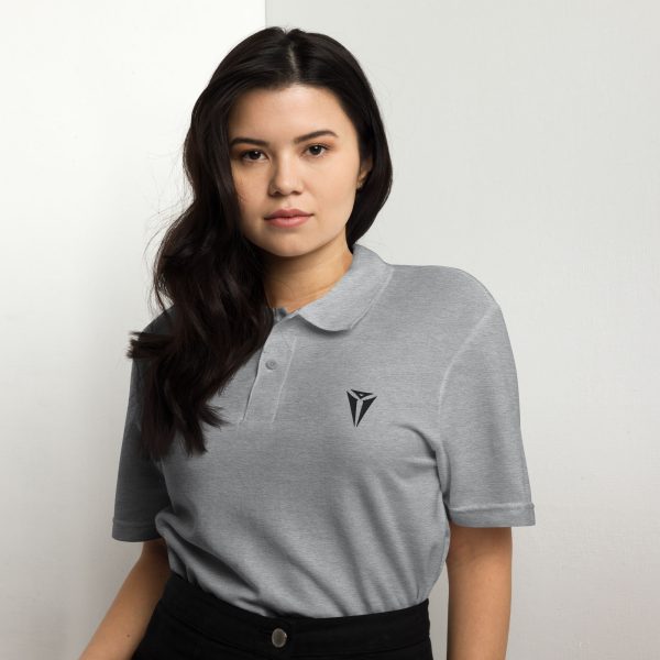 A sport grey DnD polo shirt with the symbol of Asmodeus, Archdevil and the Prince of Hell. Worn by a woman
