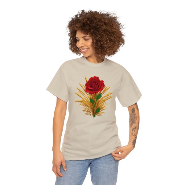 The symbol of Chauntea, a blooming rose on a sunburst wreath of golden grain. Chauntea is the goddess of life and agriculture. On a tan sand shirt worn by a woman.