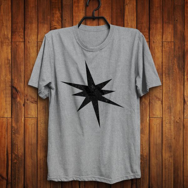 The star ray symbol of Erevan Ilesere, the elven god of mischief and rogue, on a sport gray shirt hanging on a wall