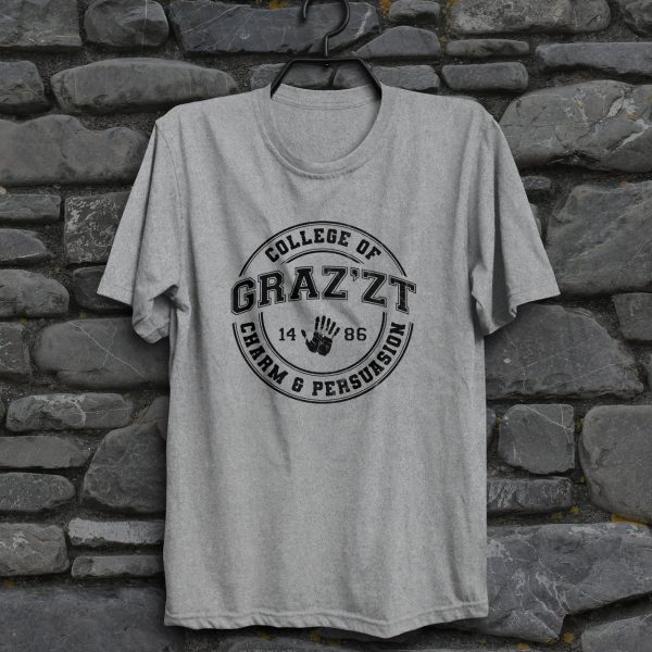 A fun collegiate shirt for Grazzt's College of Charm and Persuation - Grazzt is a gorgeous demon lord that rule through charm and manipulation; a famous DnD villain. This is a sport gray shirt hanging on a wall