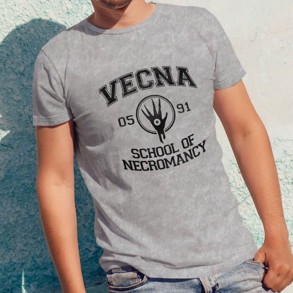 A weathered sport gray shirt with the Vecna School of Necromancy, worn by a man leaning against a wall.