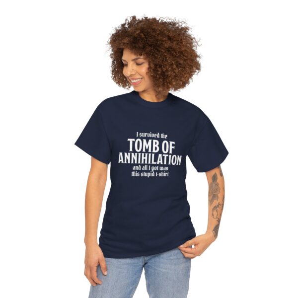 A navy blue D&D shirt telling people that you survived Acererak's Tomb of Annihilation, worn by a woman