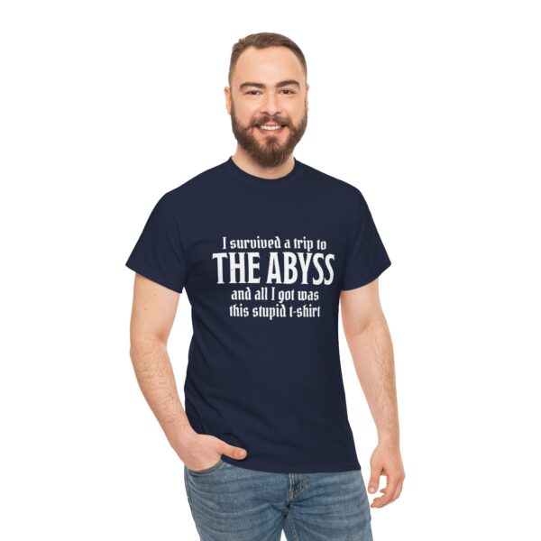 A navy blue D&D shirt telling people that you survived the Abyss, a demonic realm in D&D, worn by a man