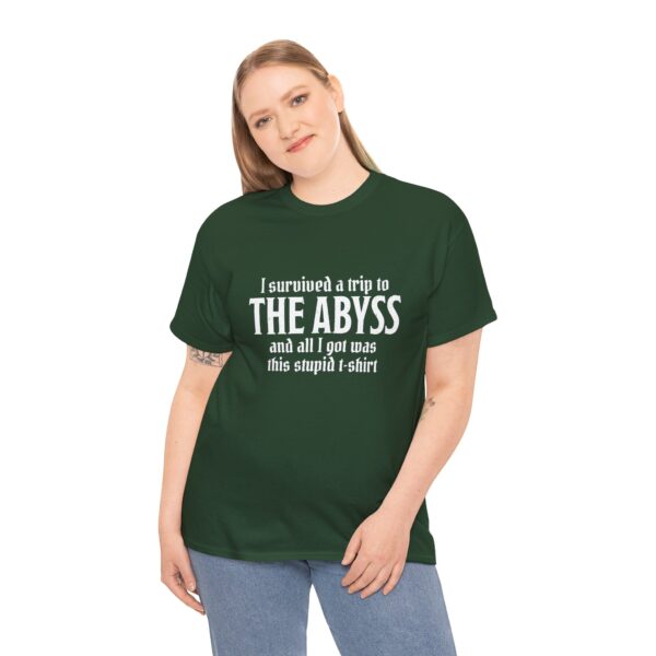 A forest green D&D shirt telling people that you survived the Abyss, a demonic realm in D&D, worn by a woman