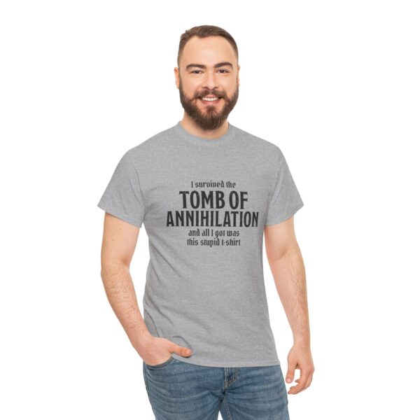 A sport gray D&D shirt telling people that you survived Acererak's Tomb of Annihilation, worn by a man