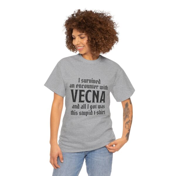 A sport gray D&D shirt telling people that you survived a D&D encounter with the powerful lich Vecna, worn by a woman