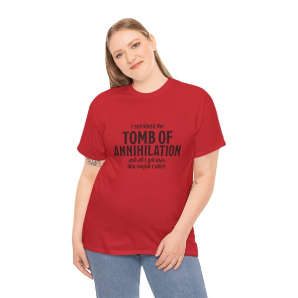 A red D&D shirt telling people that you survived Acererak's Tomb of Annihilation, worn by a woman